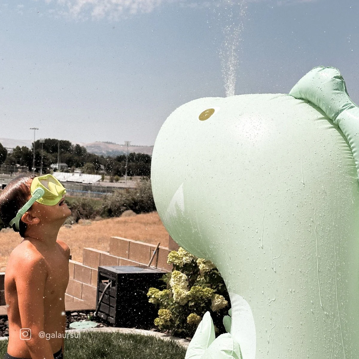 Inflatable Giant Surfing Dino Sprinkler - Image 4